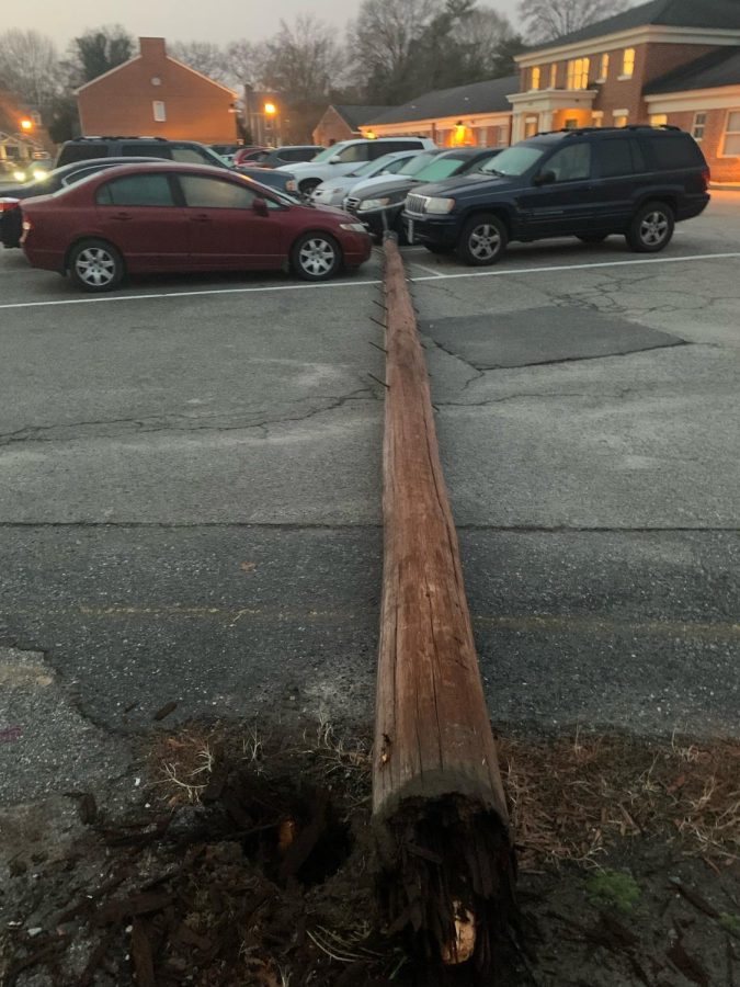 Downed pole damages three cars in freshman village